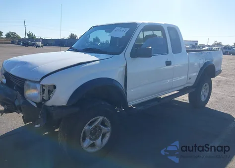 1999 Toyota Tacoma из США, поврежденный, VIN 4TAWN72N4XZ557069